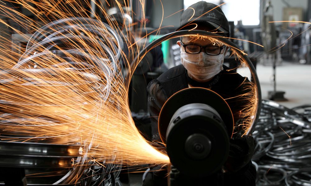 China's industrial profits extend slump into seventh month